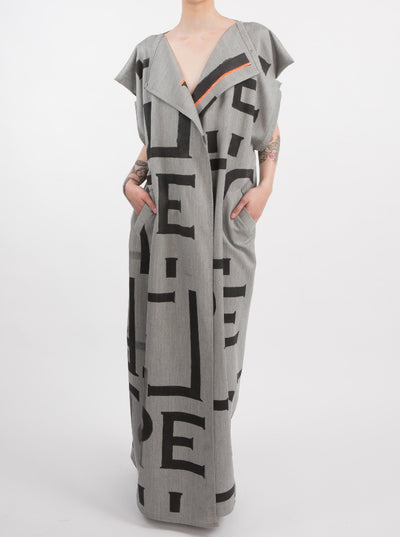 100% grey wool Tunic Coat. with handmade serigraphy. Part of our Zero-Waste line. Front view